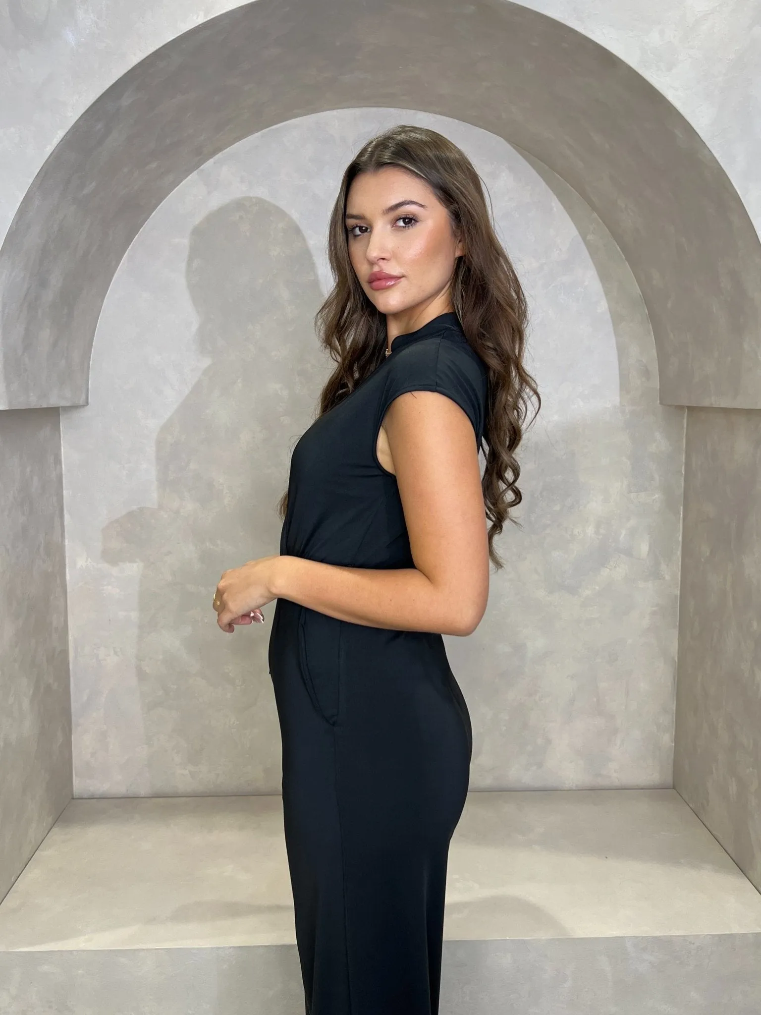 Black sleeveless jumpsuit